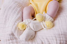 Load image into Gallery viewer, confetti kidz Knitted Booties | Snow + Yellow Pom Poms